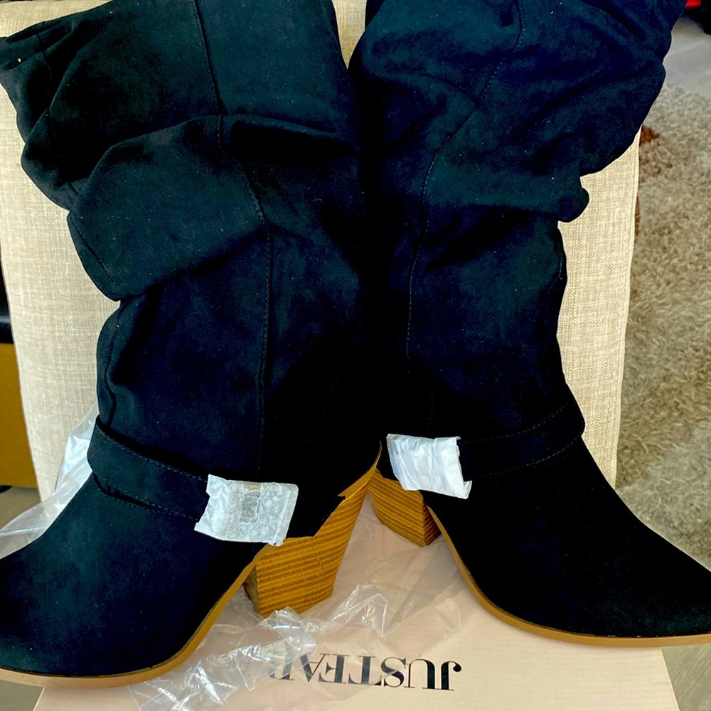 New Black boots. Size 10 .